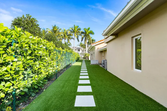 a view of yard with patio