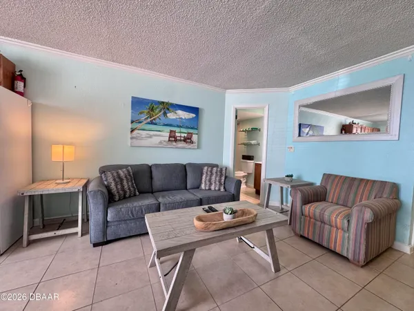 a living room with furniture and a couch