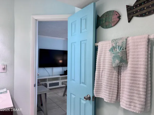 a dinning room with table and chairs