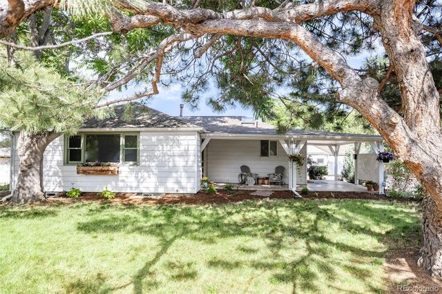a front view of a house with patio