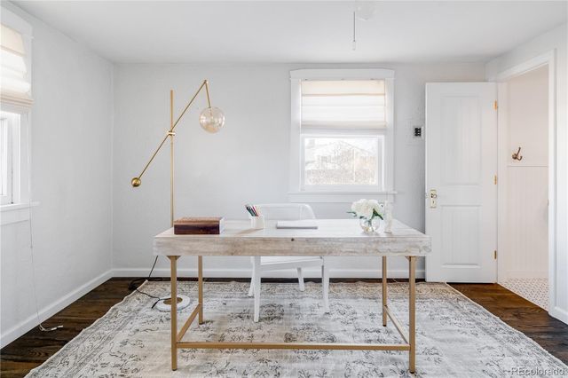 a view of a room with furniture window and wooden floor