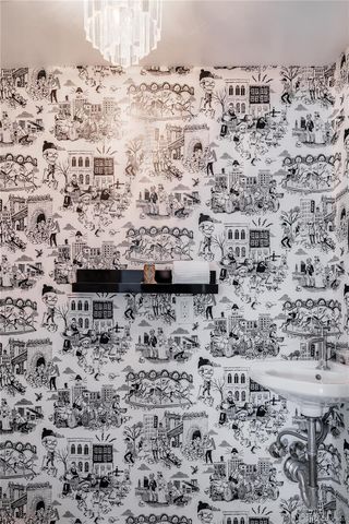 a kitchen with stainless steel appliances a stove a sink dishwasher and a refrigerator