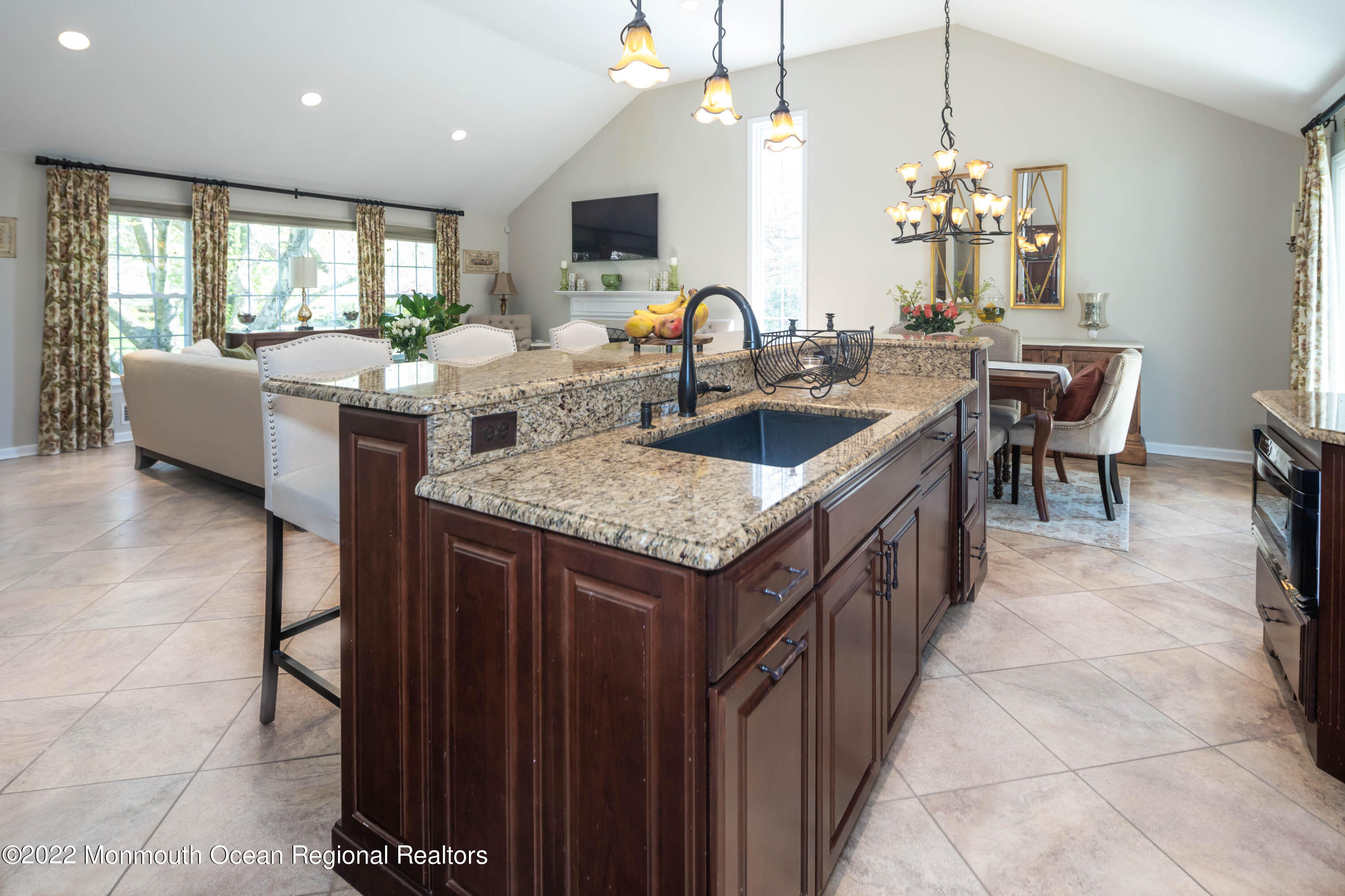 361 Dwight Road Middletown, NJ 07748 - Photo 15 of 39 an open kitchen with a sink and breakfast area