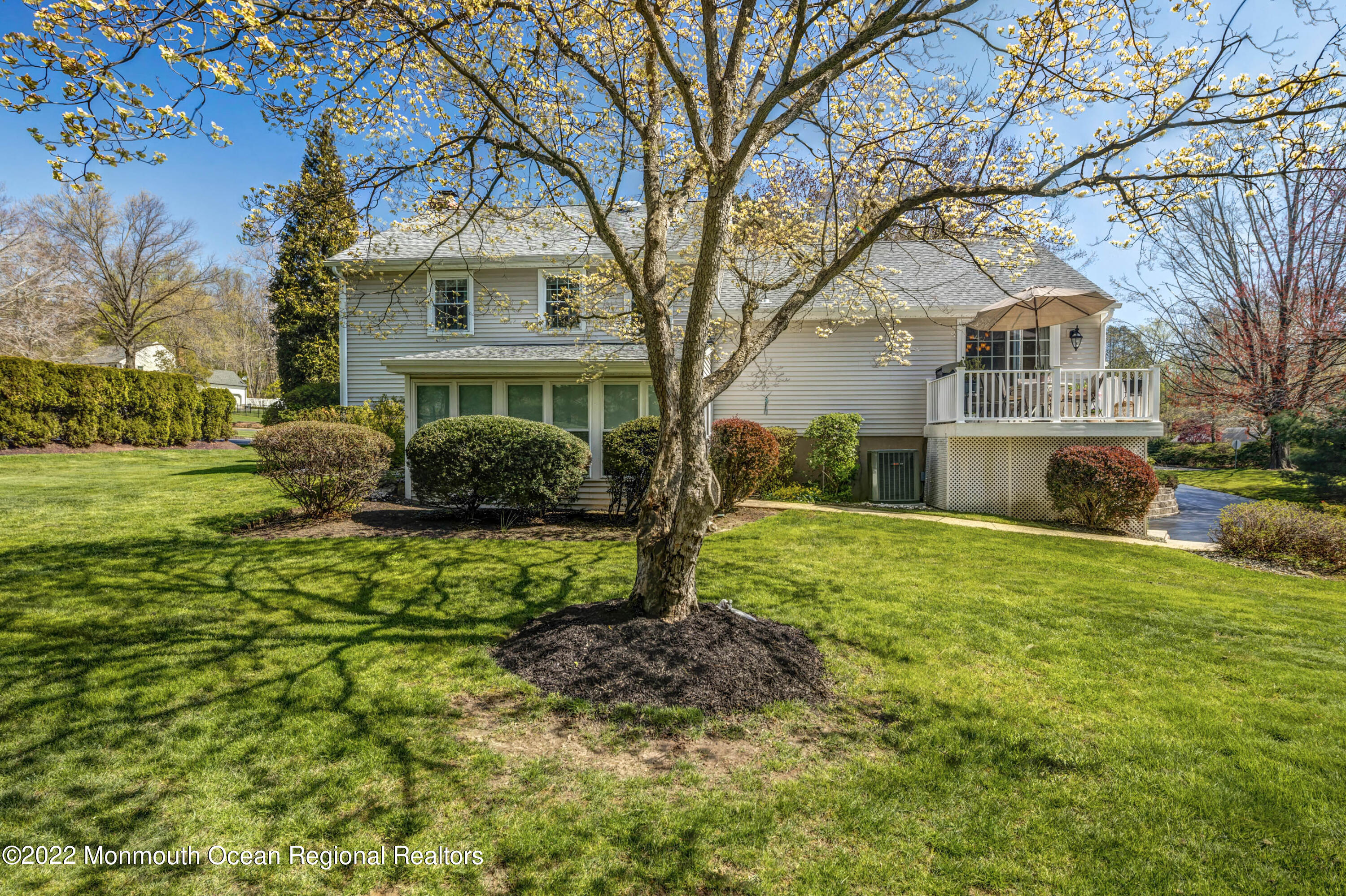 361 Dwight Road Middletown, NJ 07748 - Photo 36 of 39 a front view of a house with garden