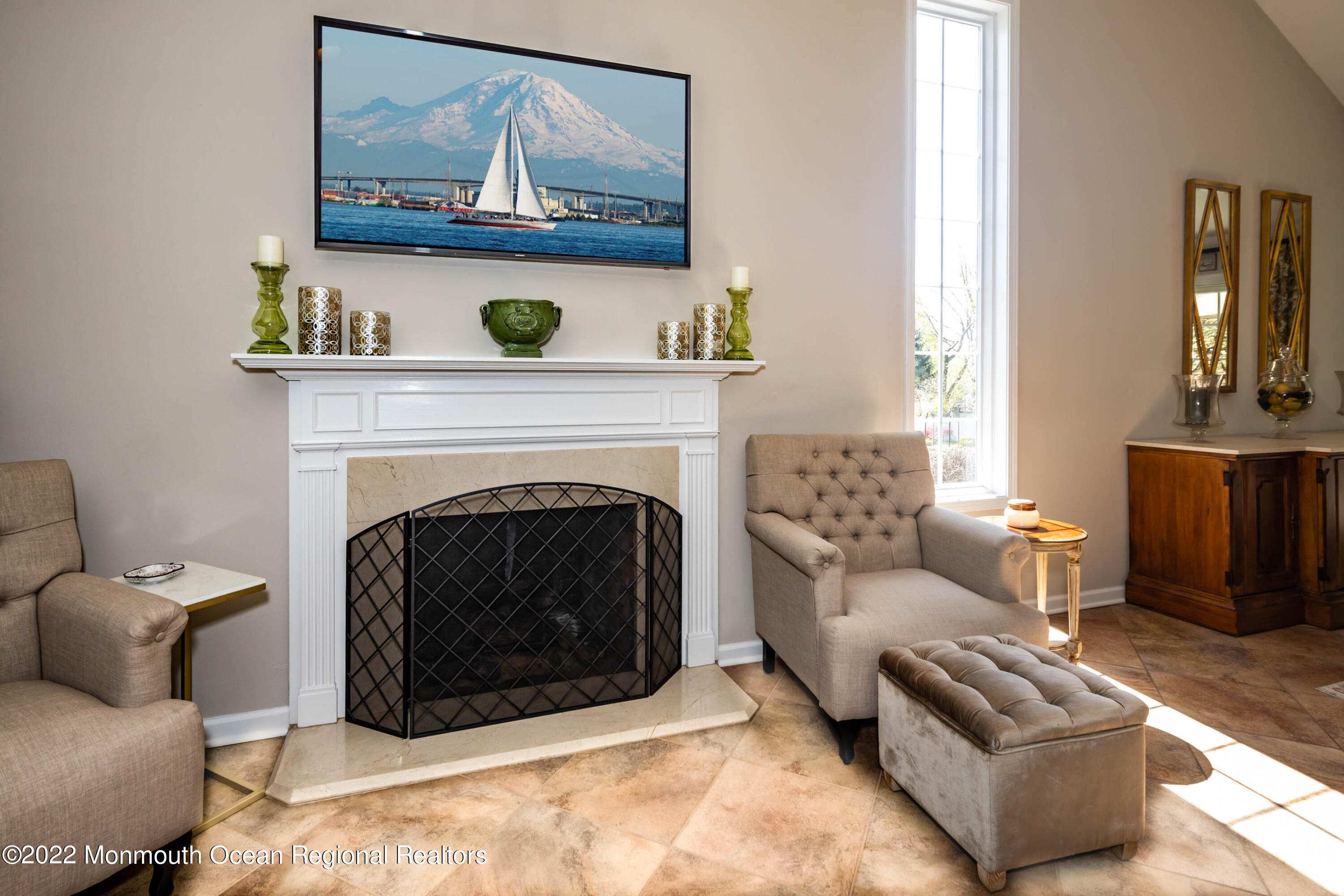 361 Dwight Road Middletown, NJ 07748 - Photo 7 of 39 a living room with furniture and a fireplace