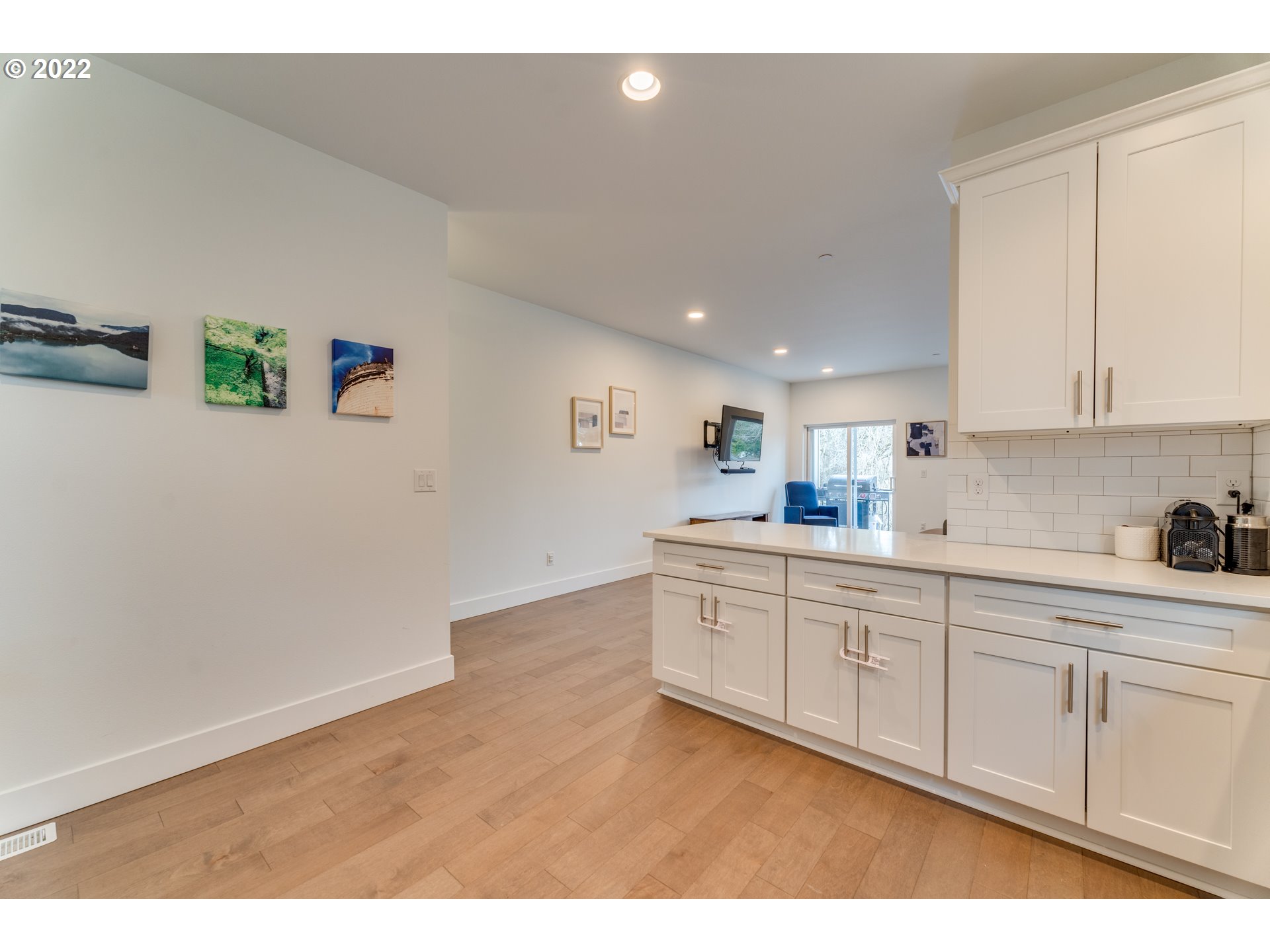 4209 Southeast 80th Avenue Portland, OR 97206 - Photo 15 of 32 a kitchen with cabinets and wooden floor