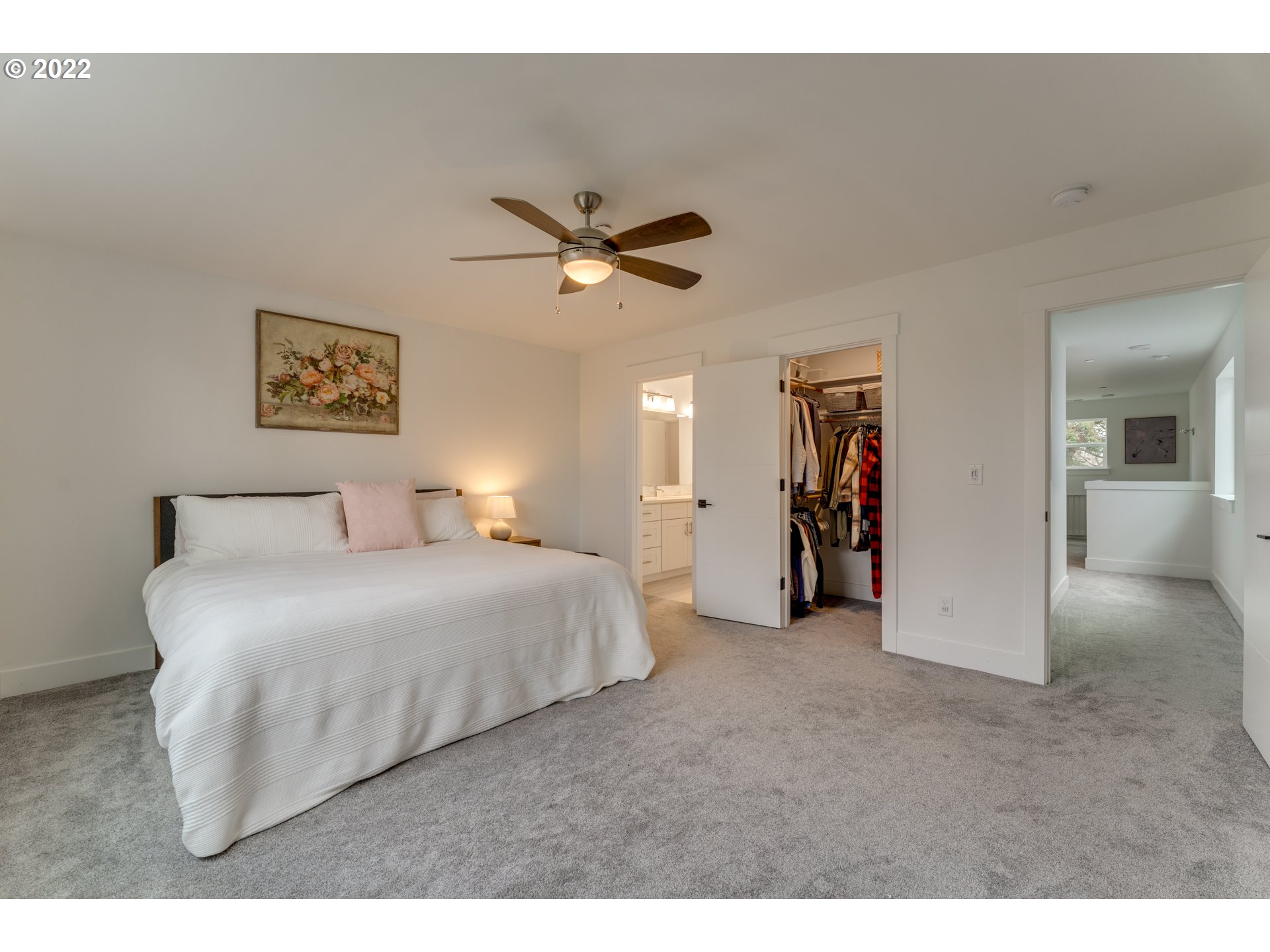 4209 Southeast 80th Avenue Portland, OR 97206 - Photo 19 of 32 a bedroom with a bed and a ceiling fan