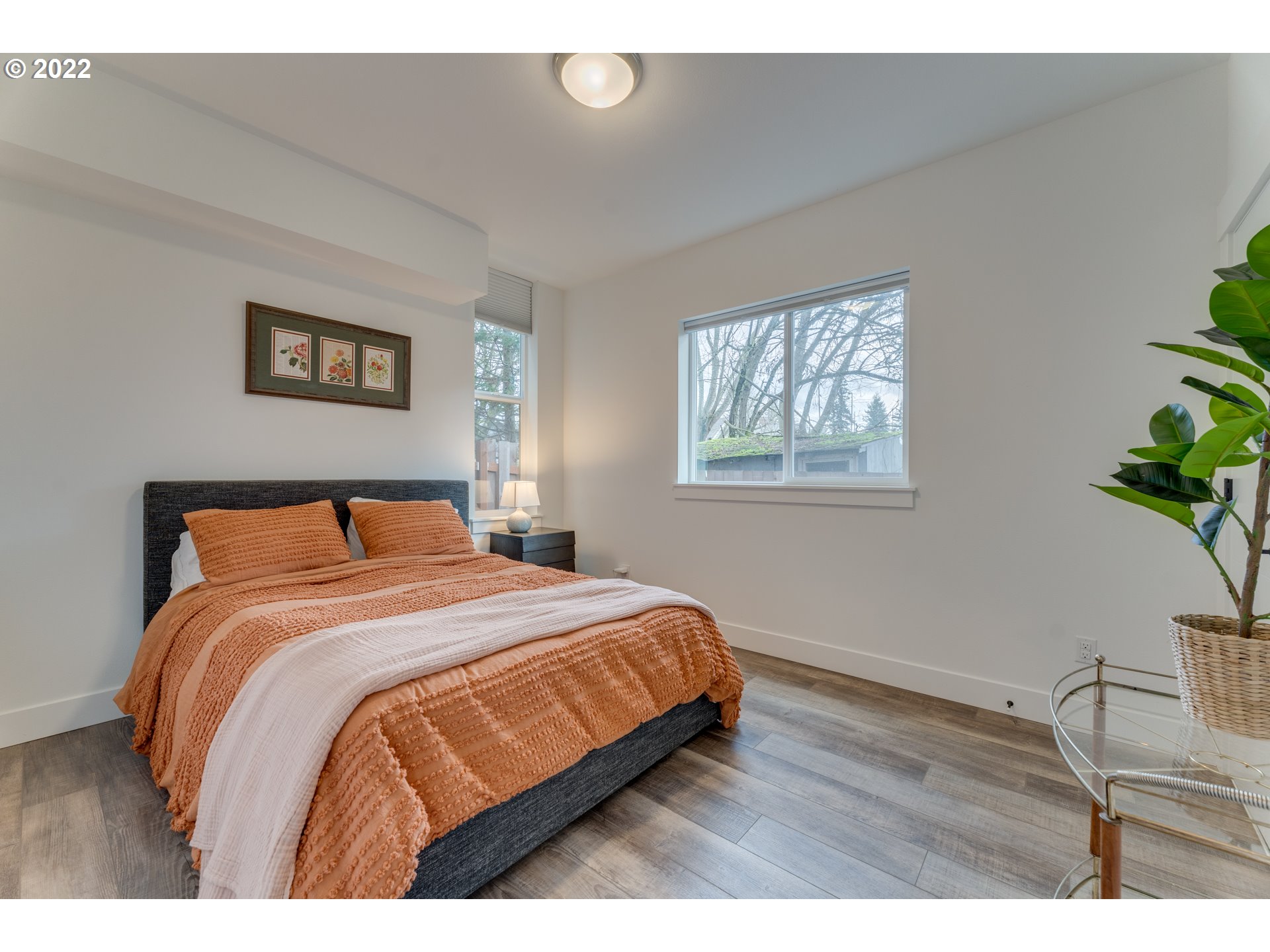 4209 Southeast 80th Avenue Portland, OR 97206 - Photo 23 of 32 a bedroom with a bed and window