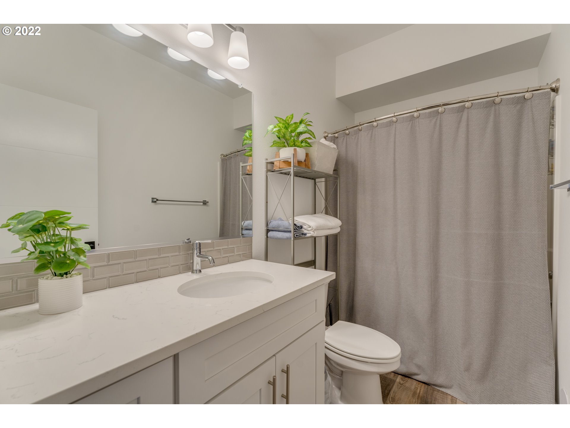 4209 Southeast 80th Avenue Portland, OR 97206 - Photo 24 of 32 a bathroom with a sink toilet and shower