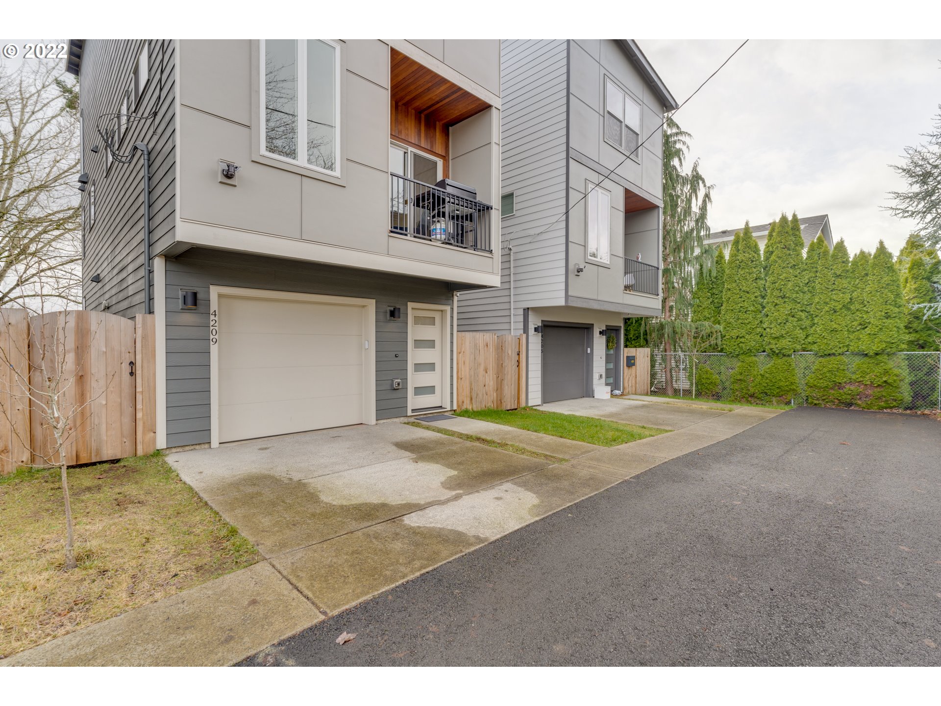 4209 Southeast 80th Avenue Portland, OR 97206 - Photo 30 of 32 a view of an house with backyard and parking