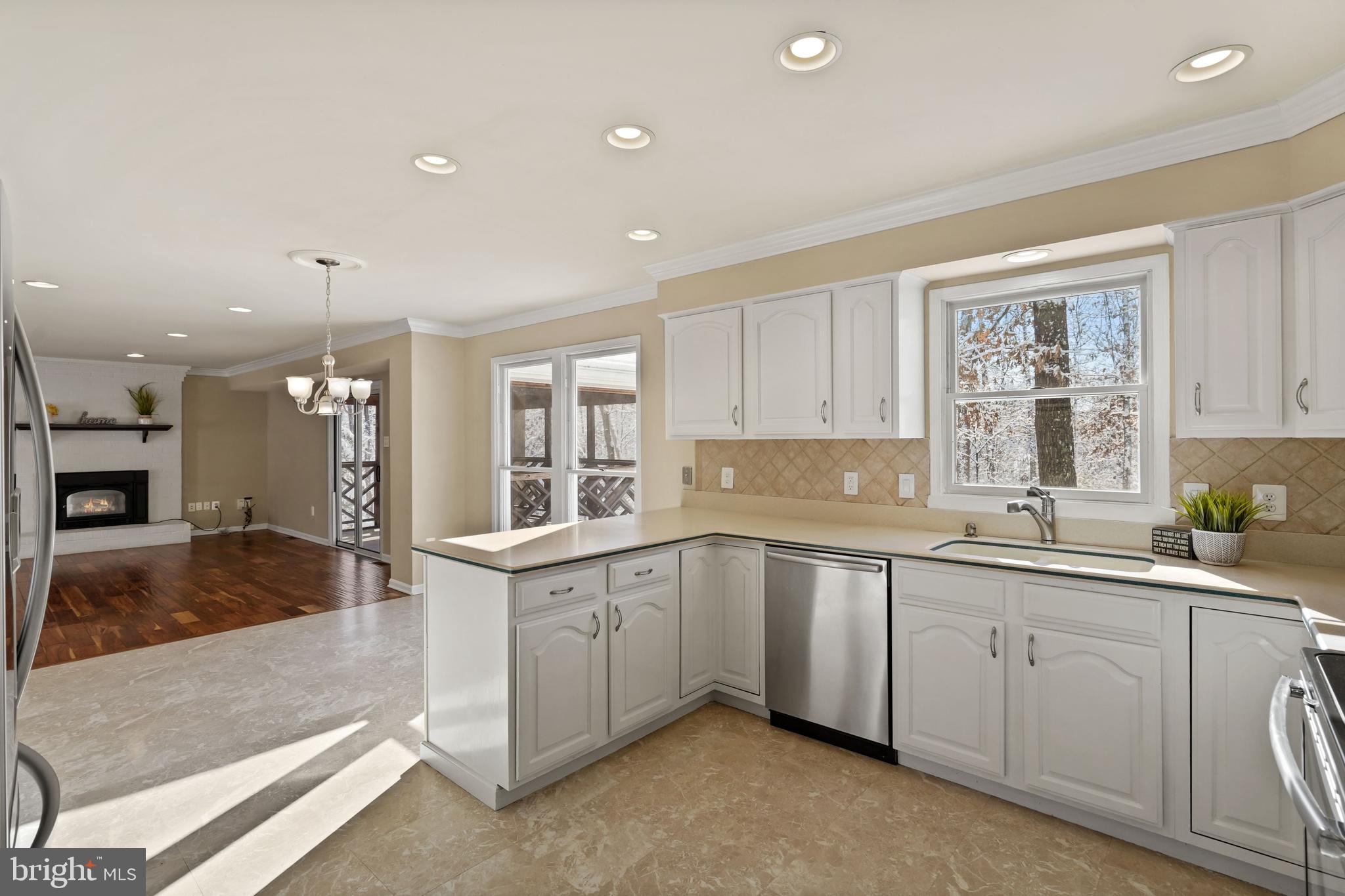 17 Cedar Drive Sterling, VA 20164 - Photo 13 of 49 white cabinets with view of backyard