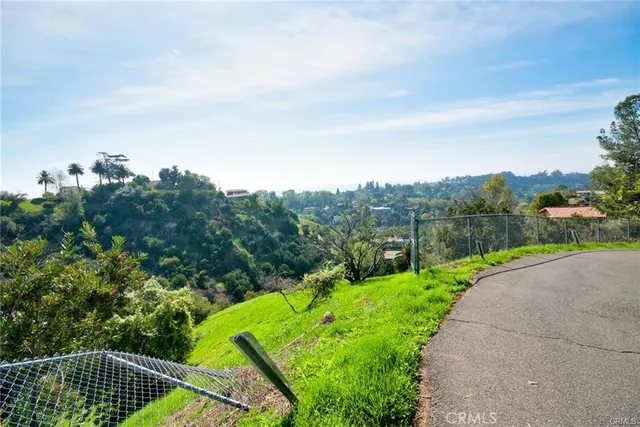 a view of a backyard with a garden