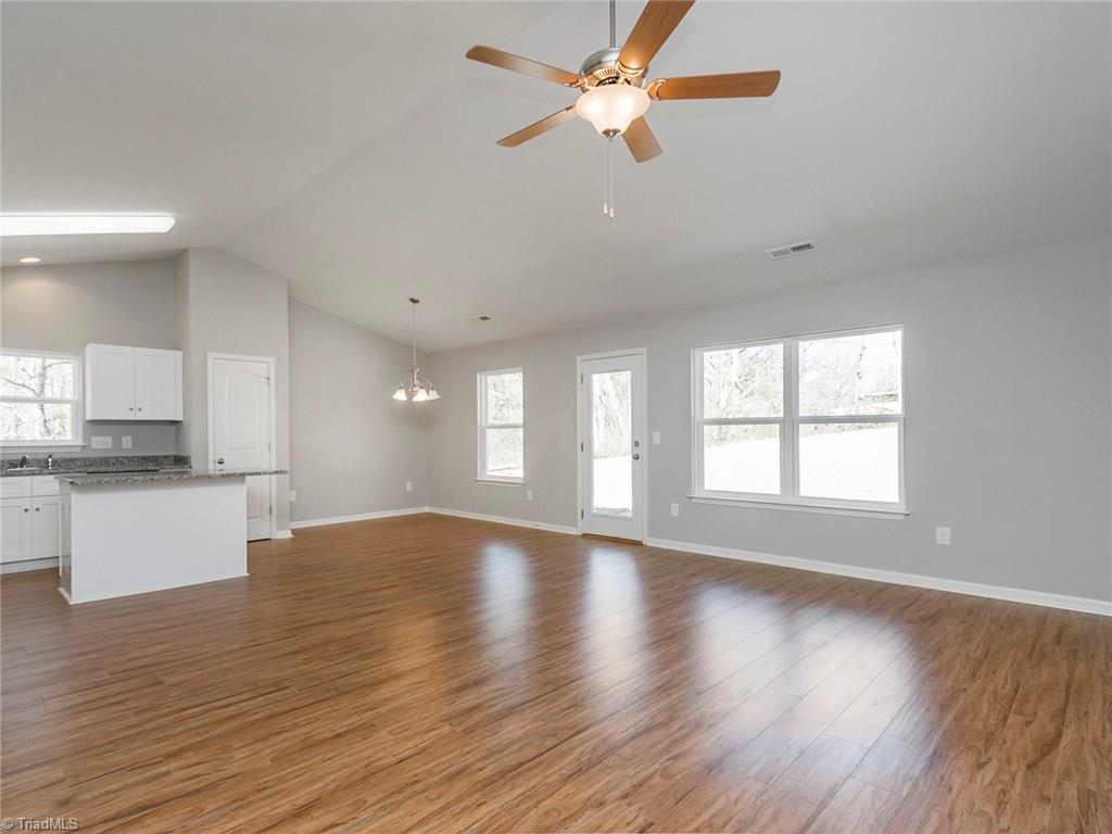 702 Prince Road Greensboro, NC 27455 - Photo 4 of 22 Eat In kitchen area and rear door out to HUGE back yard.