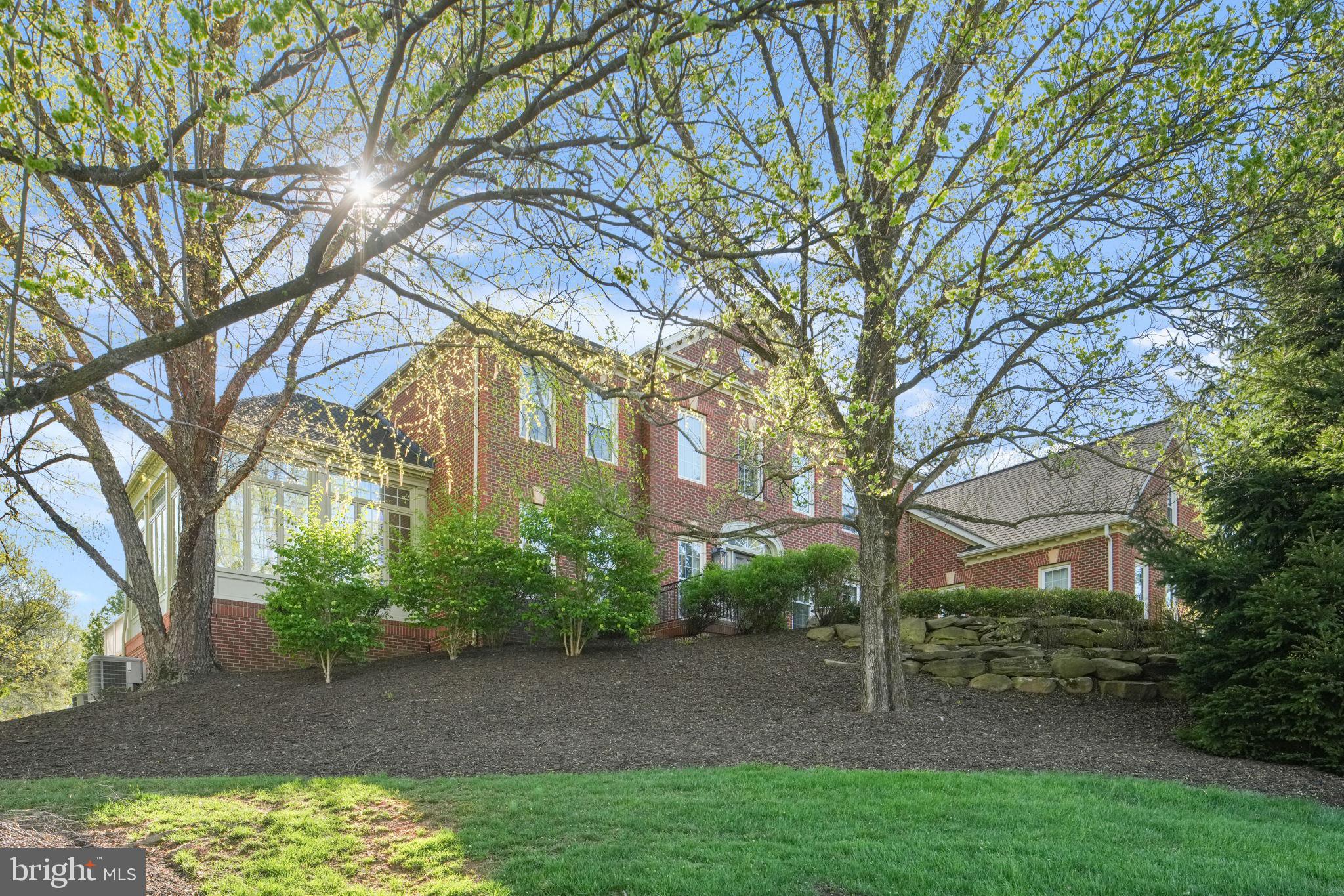 11431 Woolington Road Great Falls, VA 22066 - Photo 49 of 49 a view of a house with a yard