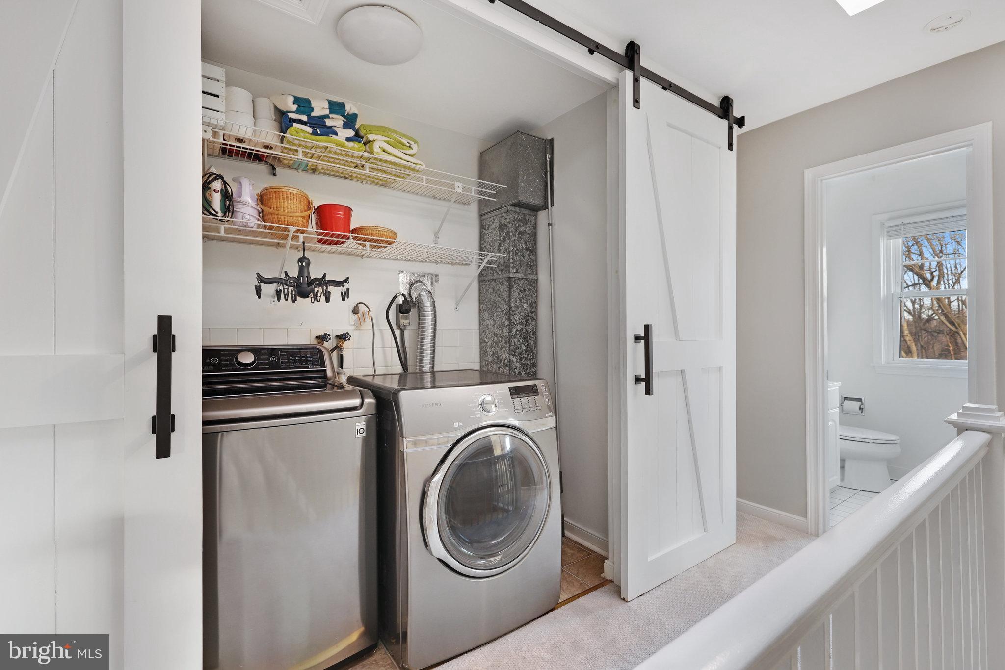 2100 Post Road Vienna, VA 22181 - Photo 50 of 72 Upper Level Laundry Room w/ Barn Door.