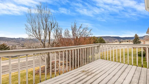 a view of a yard and front view of a house