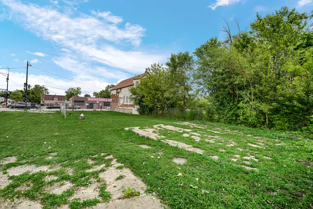 a backyard of a house with lots of green space