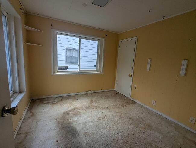 527 East Cavanaugh Road Lansing, MI 48910 - Photo 5 of 8 1st bedroom