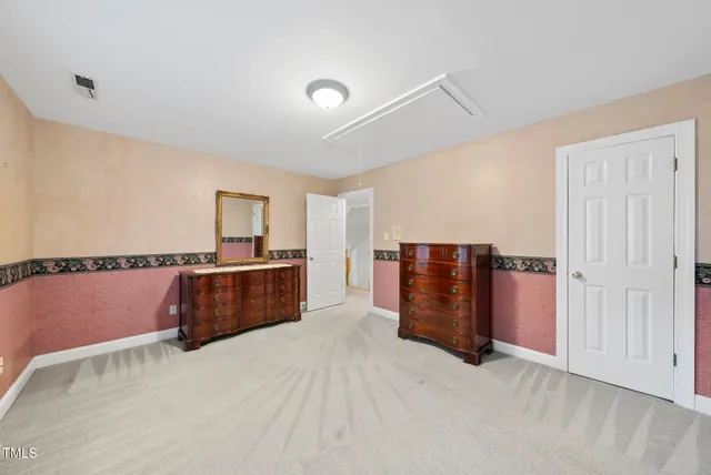 a view of a kitchen with furniture and window