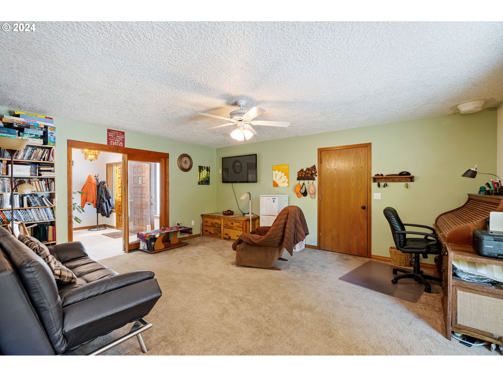3608 Northwest McCann Road Vancouver, WA 98685 - Photo 23 of 47 a living room with furniture and a large window
