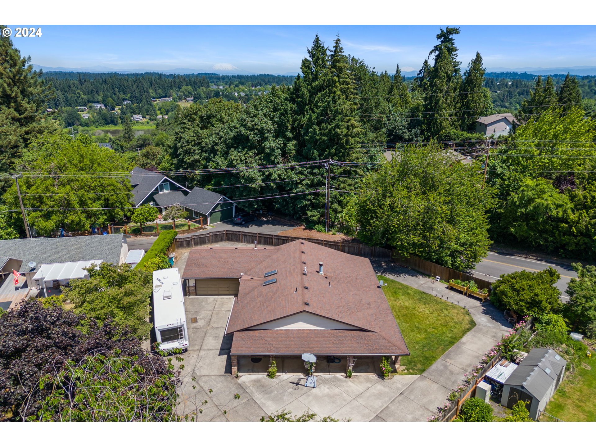 3608 Northwest McCann Road Vancouver, WA 98685 - Photo 3 of 47 an aerial view of a house with garden space and street view
