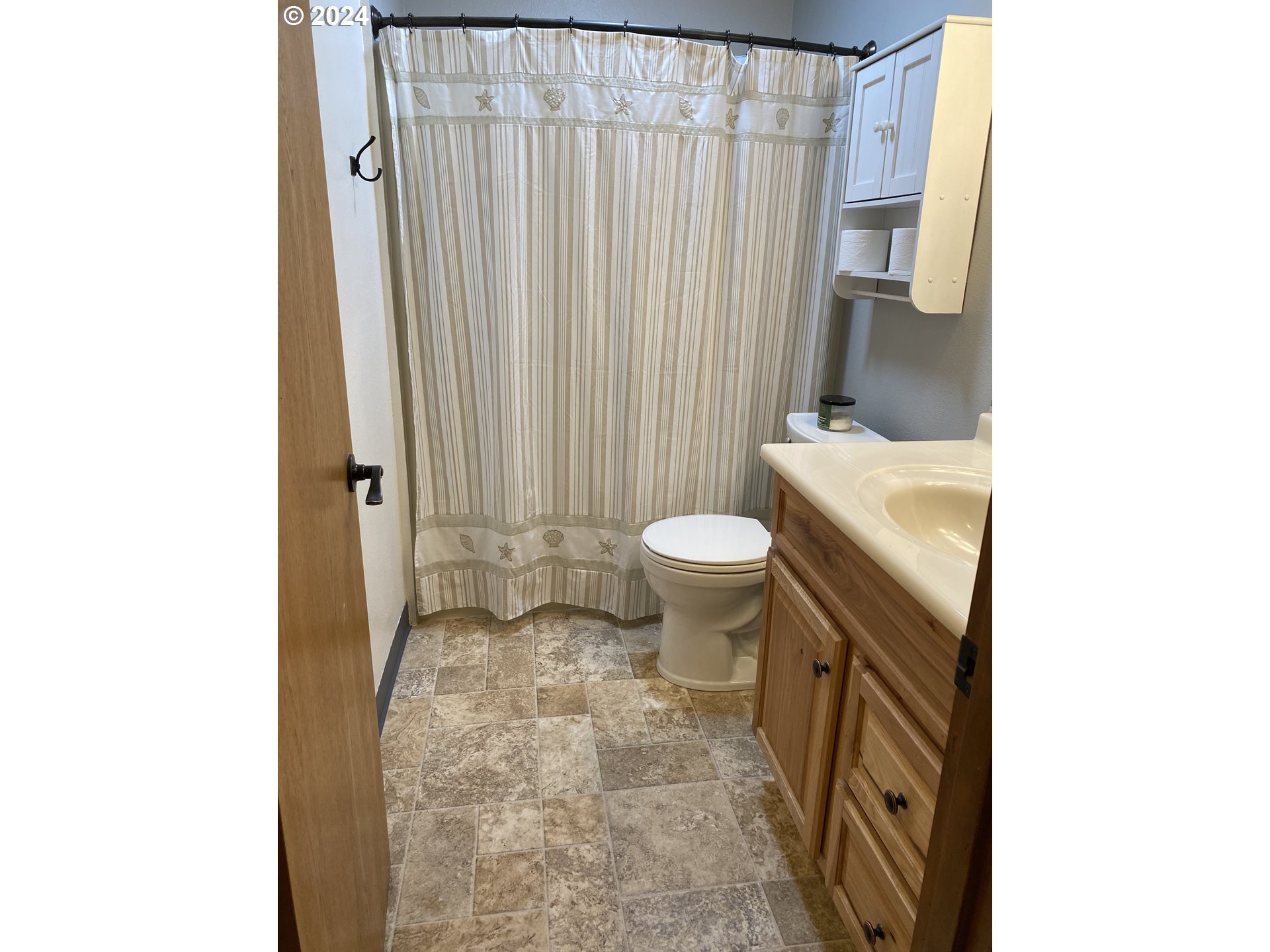 3608 Northwest McCann Road Vancouver, WA 98685 - Photo 31 of 47 a bathroom with a sink toilet and shower