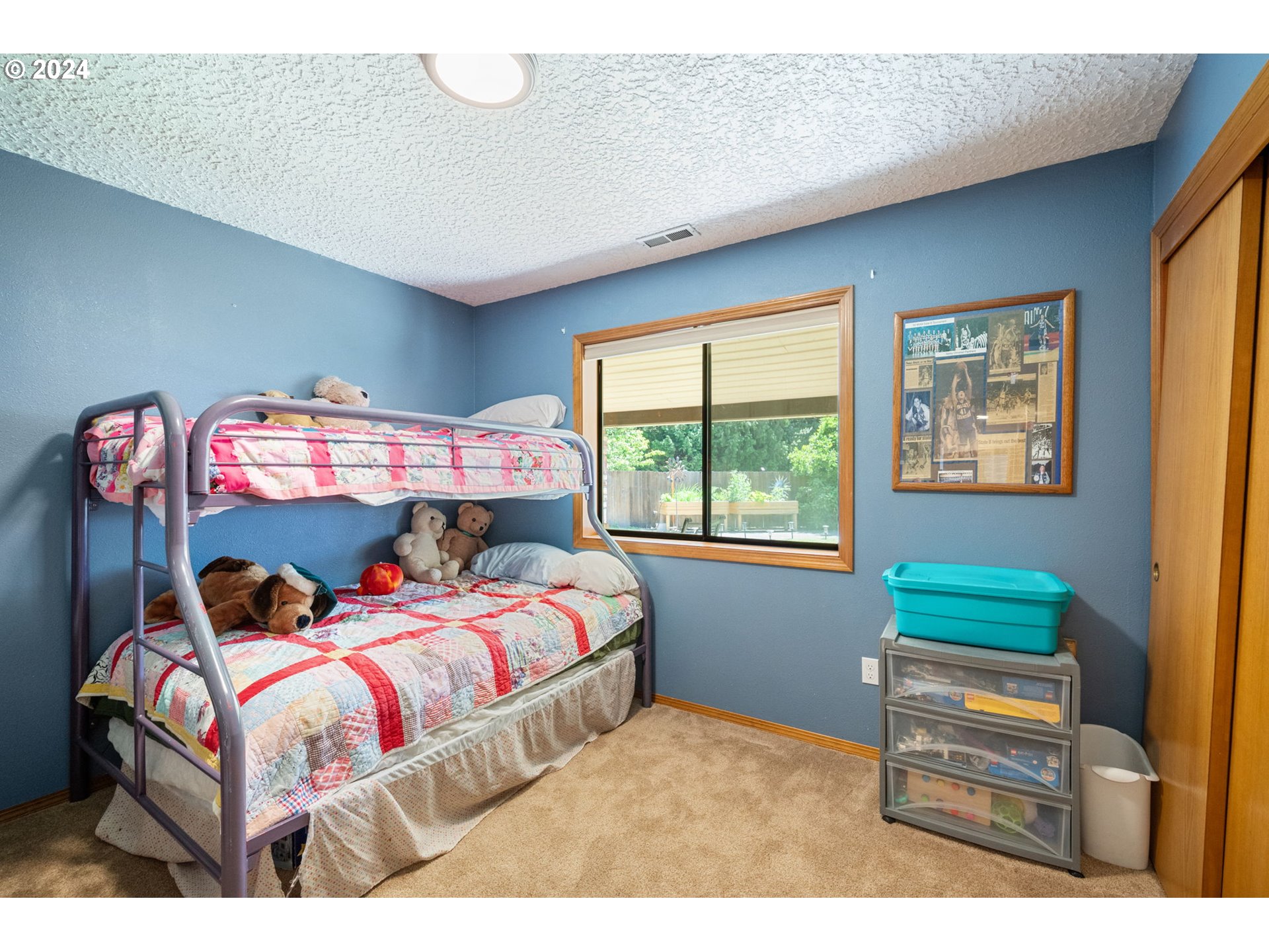 3608 Northwest McCann Road Vancouver, WA 98685 - Photo 32 of 47 a bedroom with a bed and a window