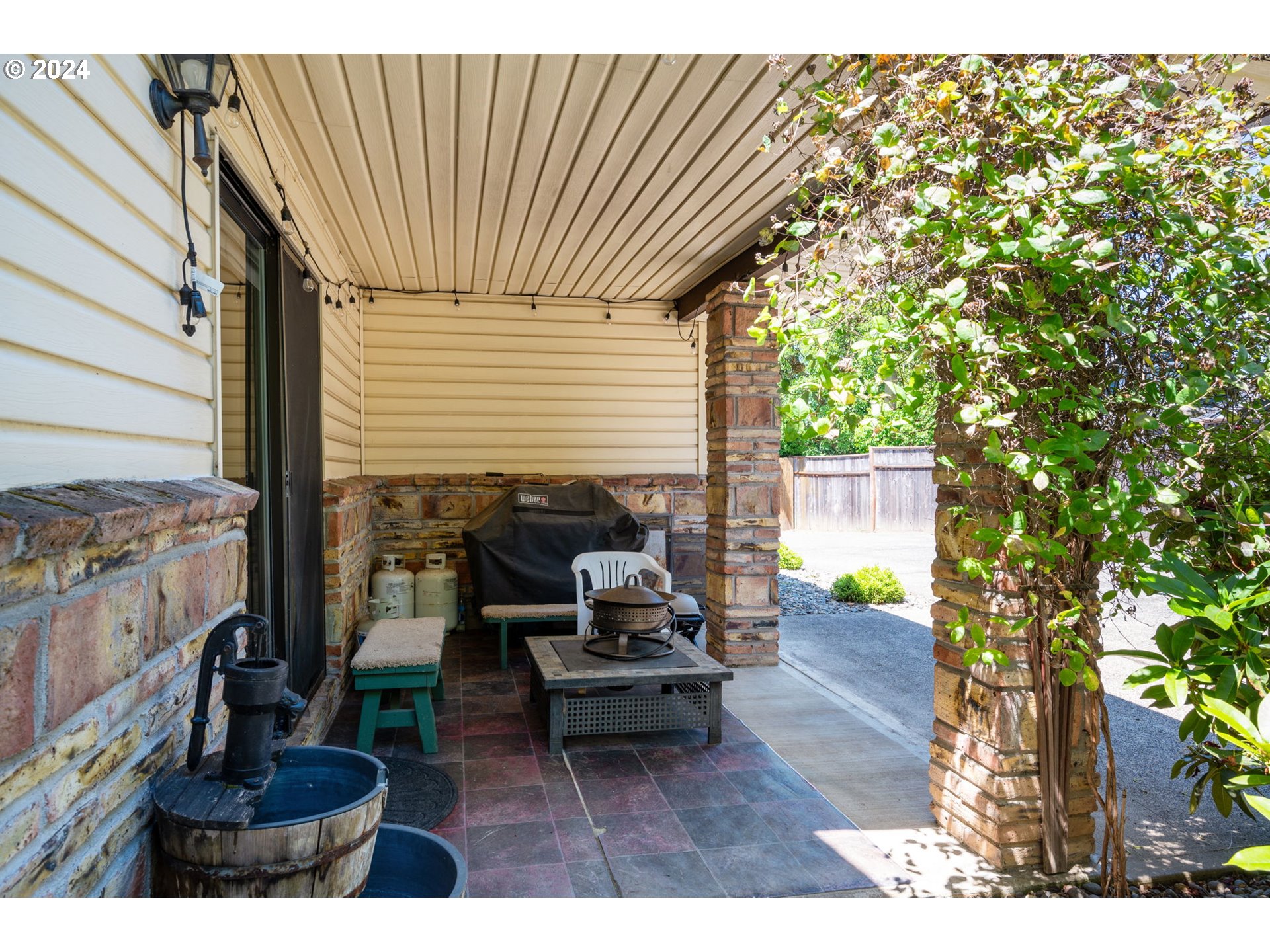 3608 Northwest McCann Road Vancouver, WA 98685 - Photo 34 of 47 a backyard of a house with table and chairs