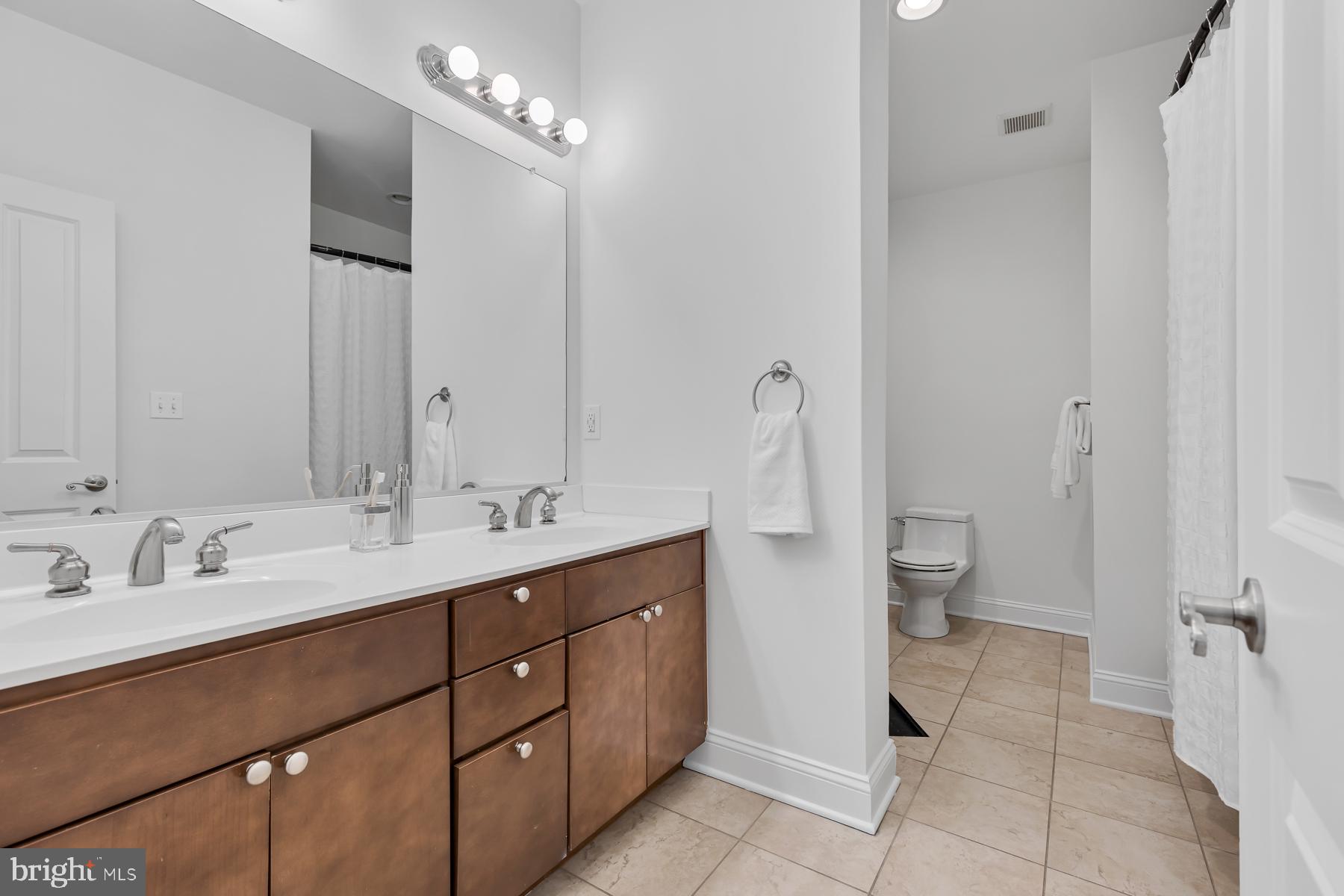 1926 Mt Royal Terrace Baltimore, MD 21217 - Photo 20 of 34 en suite primary bathroom