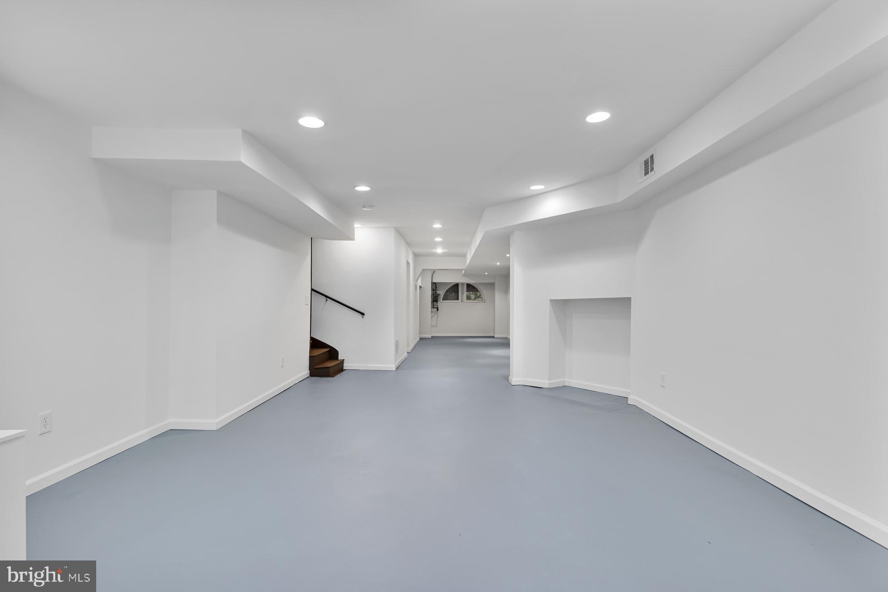 1926 Mt Royal Terrace Baltimore, MD 21217 - Photo 29 of 34 finished basement with walk out entrance