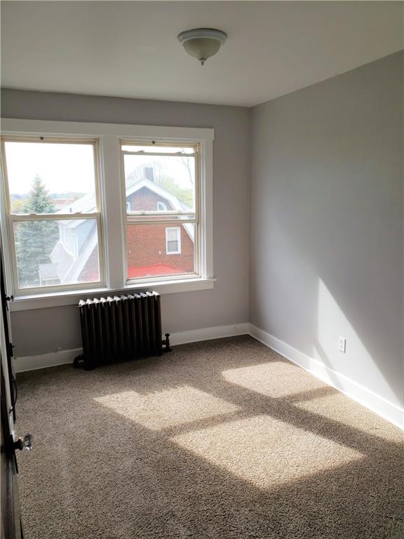 201 Richbarn Road Pittsburgh, PA 15212 - Photo 16 of 24 a view of an empty room with a window