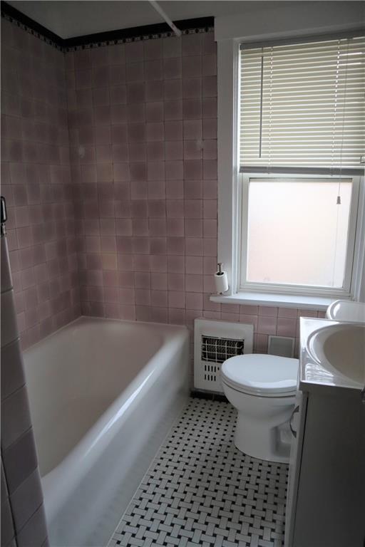 201 Richbarn Road Pittsburgh, PA 15212 - Photo 21 of 24 a bathroom with a toilet a sink and bathtub