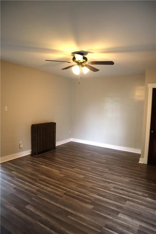 201 Richbarn Road Pittsburgh, PA 15212 - Photo 6 of 24 a view of an empty room with wooden floor