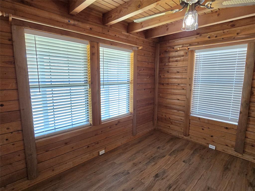 3505 Farmer Road Azle, TX 76020 - Photo 20 of 40 Wood drape rods already installed above the windows, and ready for your own decor.