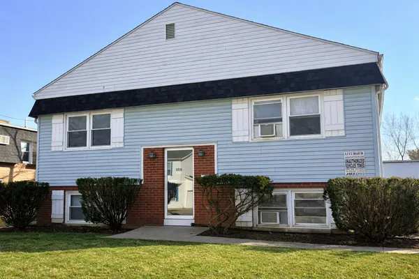 a view of a house with a patio
