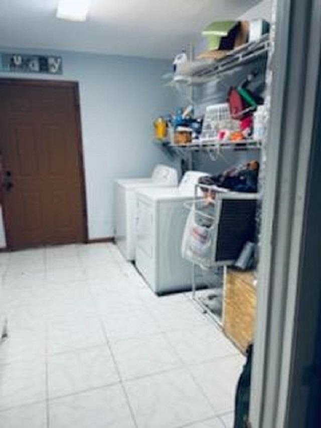 3121 Green Acres Road St. Augustine, FL 32084 - Photo 18 of 35 a utility room with dryer and washer
