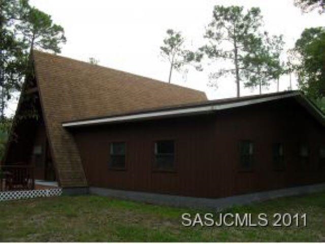 3121 Green Acres Road St. Augustine, FL 32084 - Photo 2 of 35 a backyard of a house