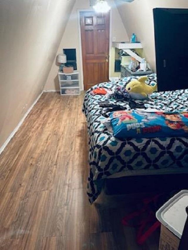 3121 Green Acres Road St. Augustine, FL 32084 - Photo 23 of 35 a bed sitting in a bedroom next to a window