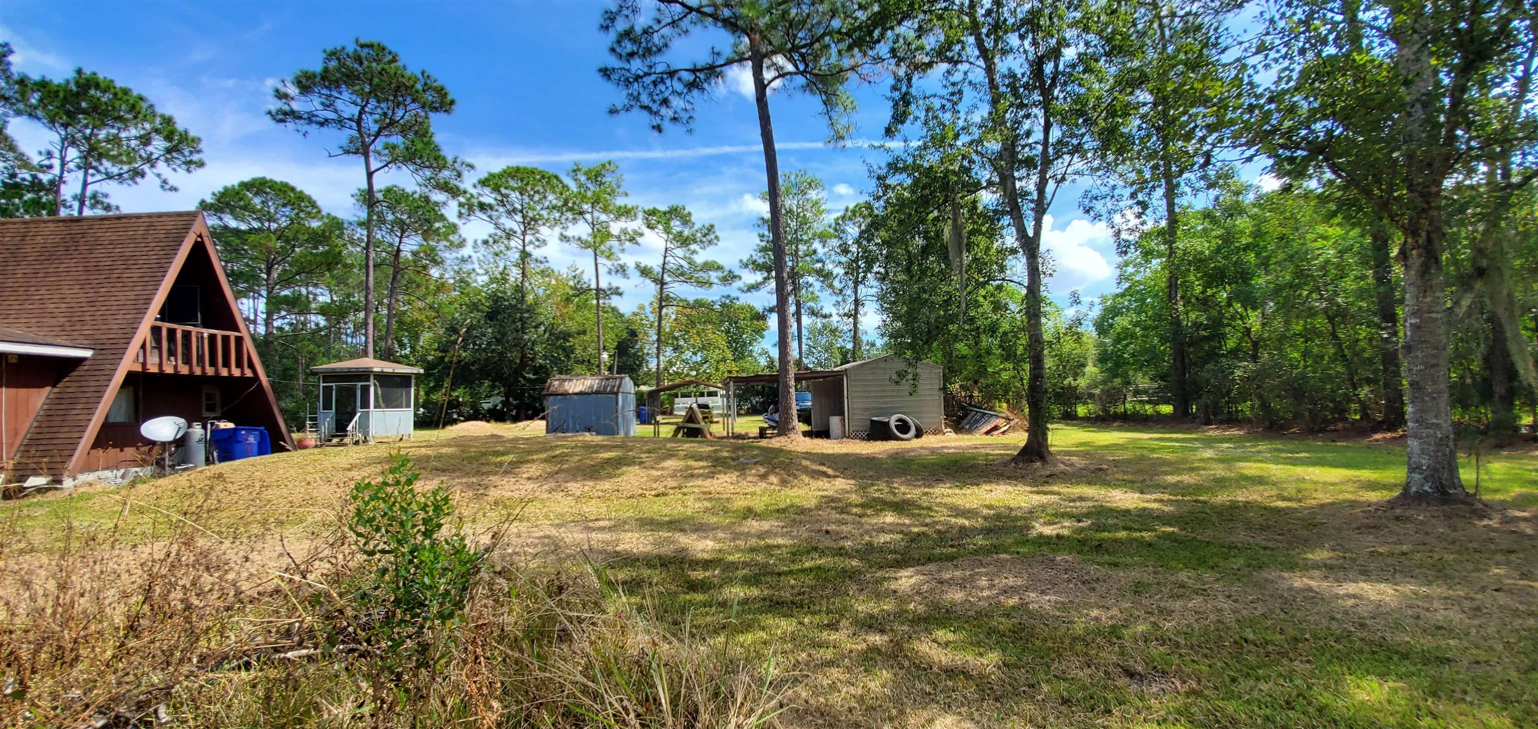 3121 Green Acres Road St. Augustine, FL 32084 - Photo 30 of 35 a view of back yard of the house