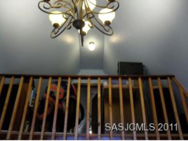 3121 Green Acres Road St. Augustine, FL 32084 - Photo 3 of 35 a view of wooden staircase