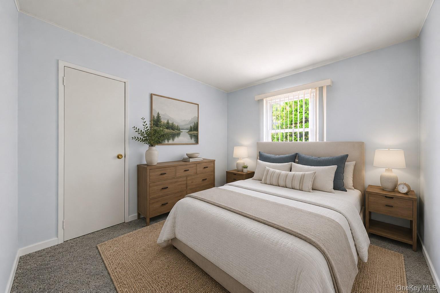 59 Maybrook Road North Babylon, NY 11703 - Photo 18 of 43 a bedroom with a bed and a window