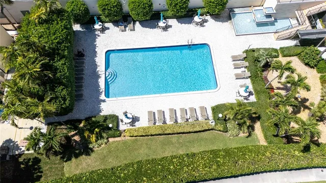 a view of swimming pool with a yard