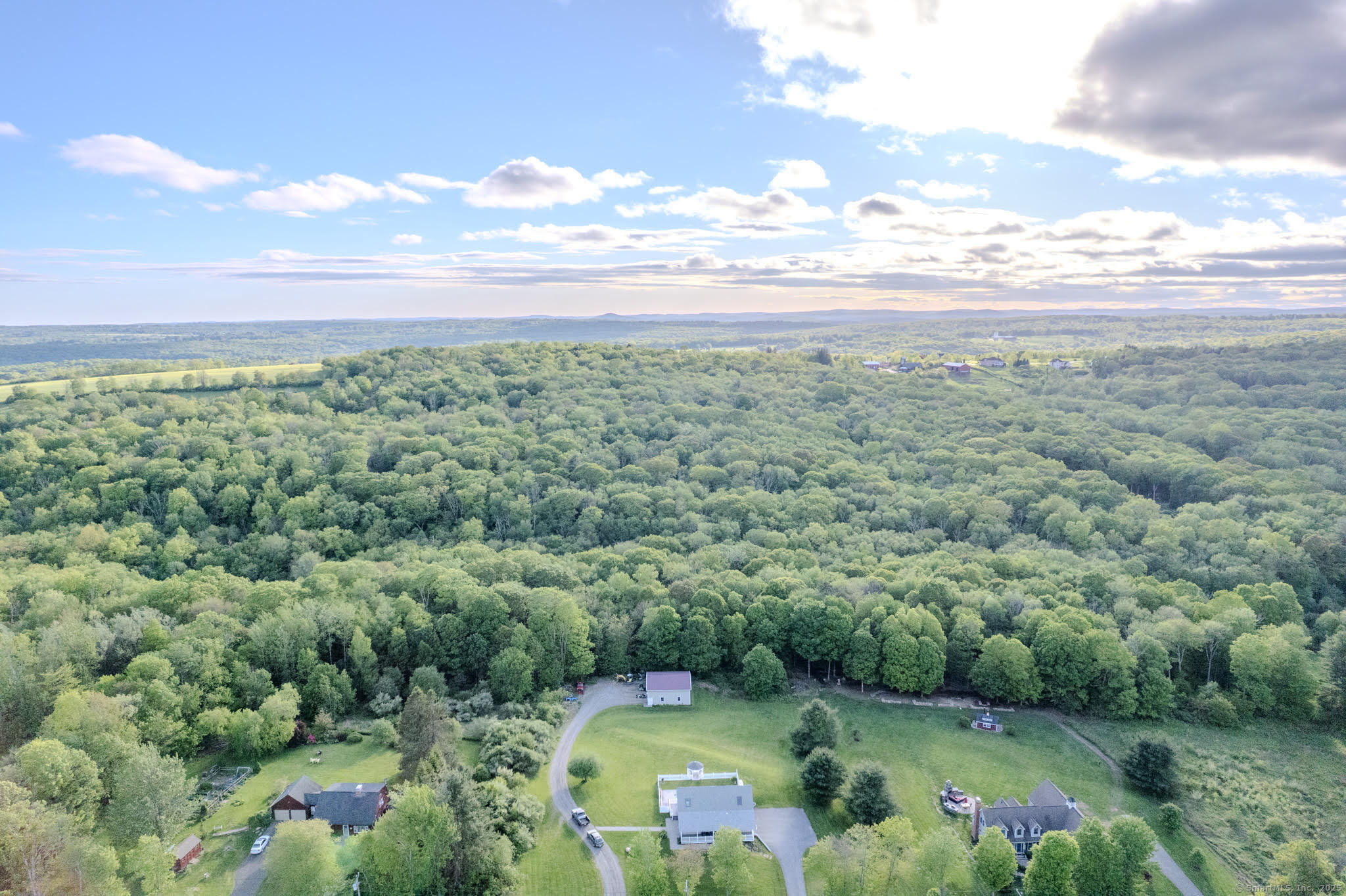 115 McBride Road Litchfield, CT 06759 - Photo 15 of 28 a view of a garden with an outdoor space