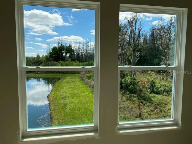 a view of a lake from a window