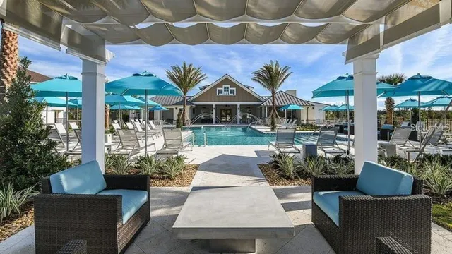 a front view of a building with seating space