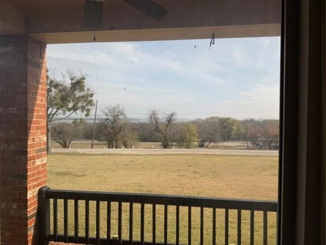 a view of a lake from a balcony