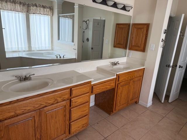2348 St Paul Road St. Paul, TX 75098 - Photo 17 of 34 a bathroom with a sink and a bathtub