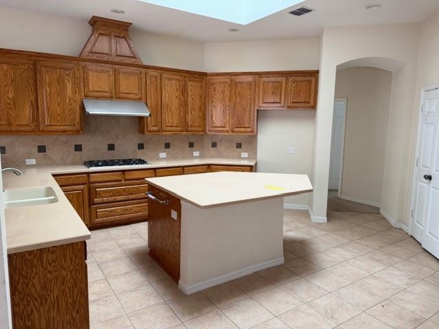 2348 St Paul Road St. Paul, TX 75098 - Photo 9 of 34 a kitchen with stainless steel appliances a sink a stove and a refrigerator