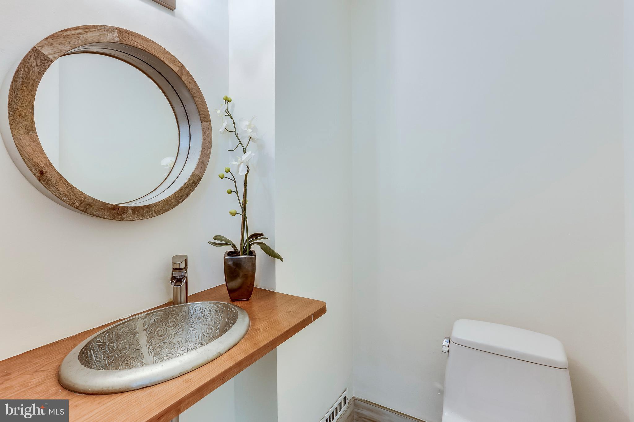 123 Tennessee Avenue Northeast Washington, DC 20002 - Photo 12 of 27 a bathroom with a toilet and a sink