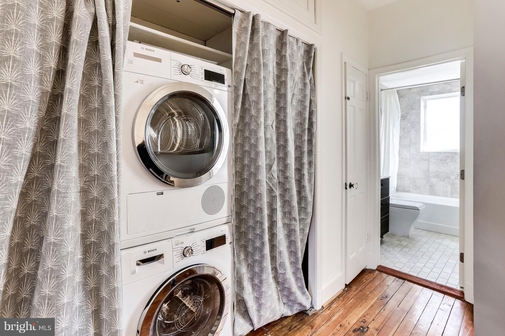 123 Tennessee Avenue Northeast Washington, DC 20002 - Photo 23 of 27 a view of a bedroom with washer and dryer